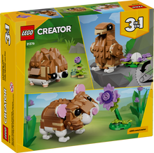 31376 Cute Hamster with a Flower